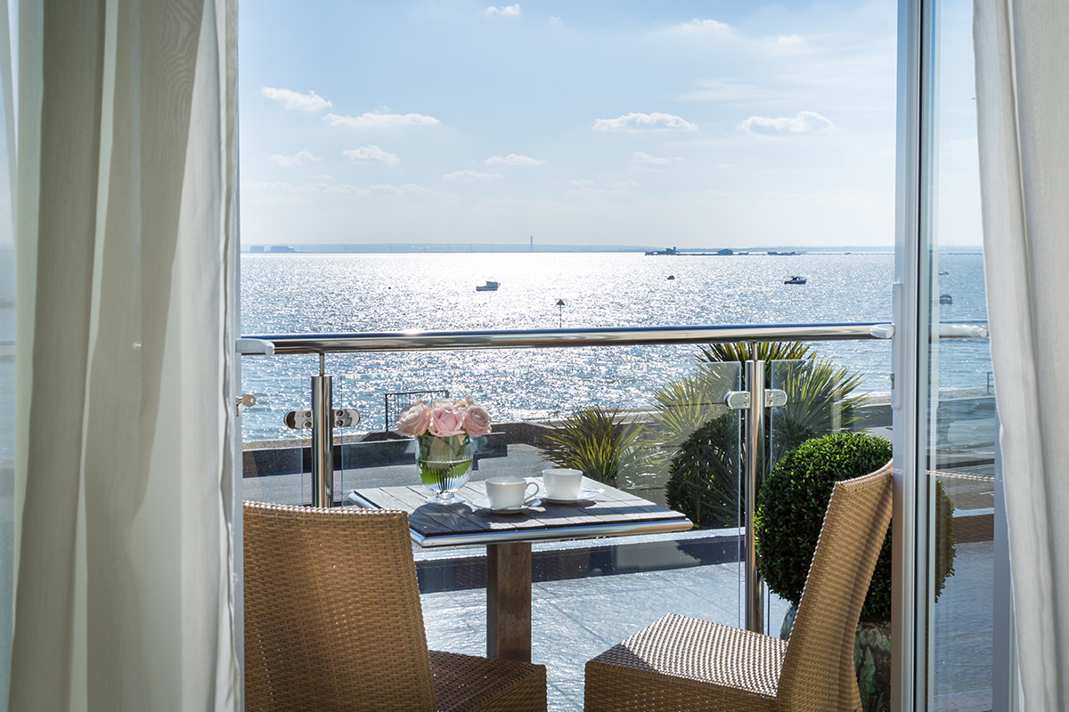 A photo of a balcony view at the Roslin Beach Hotel in Southend, overlooking the estuary.
